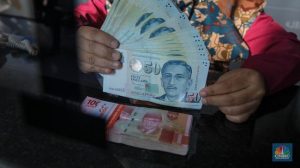 Rupiah Tertekan, Dolar Singapura Dekati Level Rp14.000